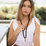 Brass Tooth Lava Necklace